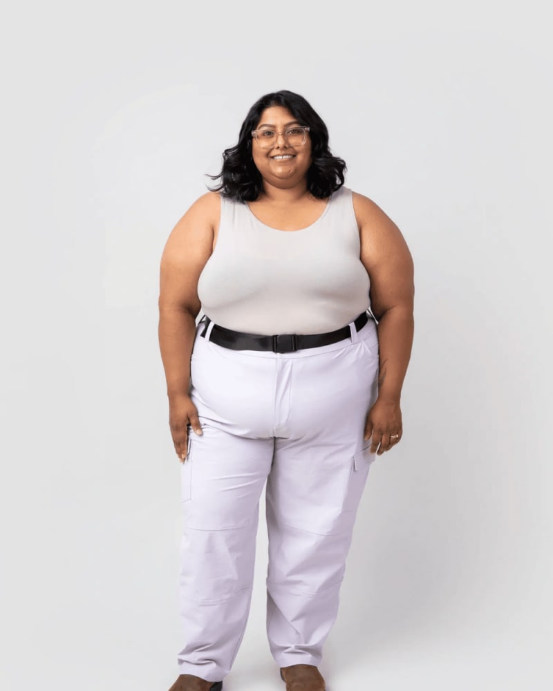 Front of a model wearing a size 4X take a hike cargo pants in Iris by alder apparel. | dia_product_style_image_id:300659